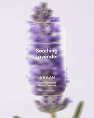 HAAN soothing lavender hand cleaner bottle with lavender flowers in the background