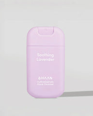 A lavender-colored HAAN Soothing Lavender Hydroalcoholic Hand Cleanser bottle, shown on a neutral light gray background.